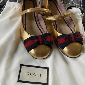 Gucci Gold Mary Jane Flats with Bow Accent